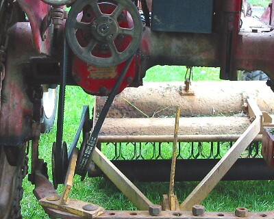 Mott Flail Mower center mounted on an early Farmall Cub Joe Therrien